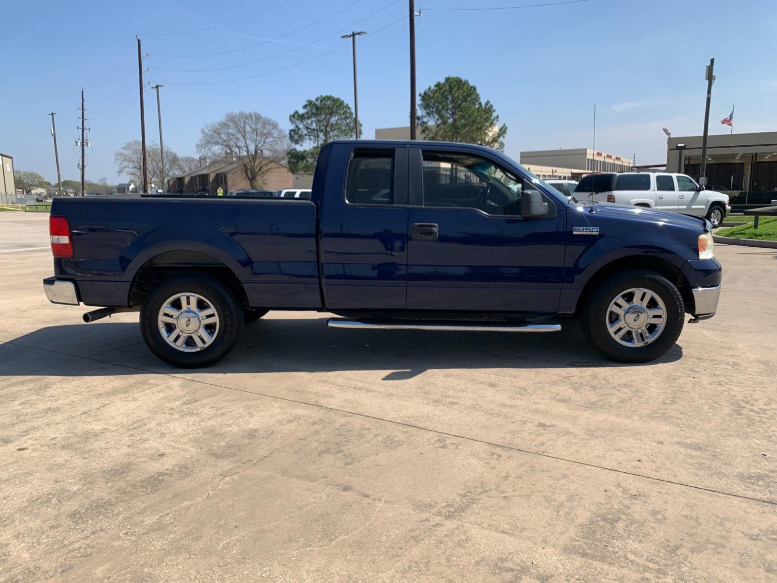 2008 BLUE /black Ford F-150 Lariat SuperCab 2WD (1FTPX12V48K) with an 5.4L V8 SOHC 24V FFV engine, 4-Speed Automatic Overdrive transmission, located at 14700 Tomball Parkway 249, Houston, TX, 77086, (281) 444-2200, 29.928619, -95.504074 - Photo #7
